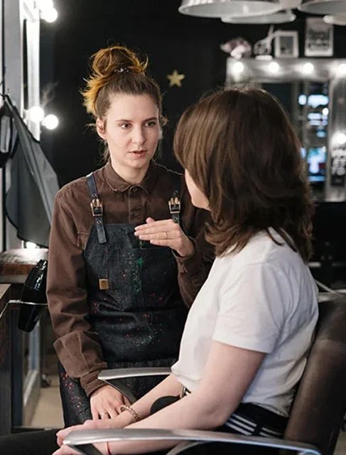 Cosnultation with a client at capelli salon Austin TX