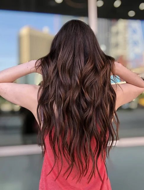 A low-maintenance option for a fuller look, seamlessly blended into your natural hair. We offered Premium looking Hand Tied Wefts in Capelli Salon Austin TX.