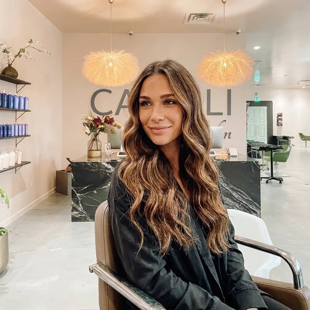 Hand-tied weft hair extensions for natural volume at Capelli Salon Dallas